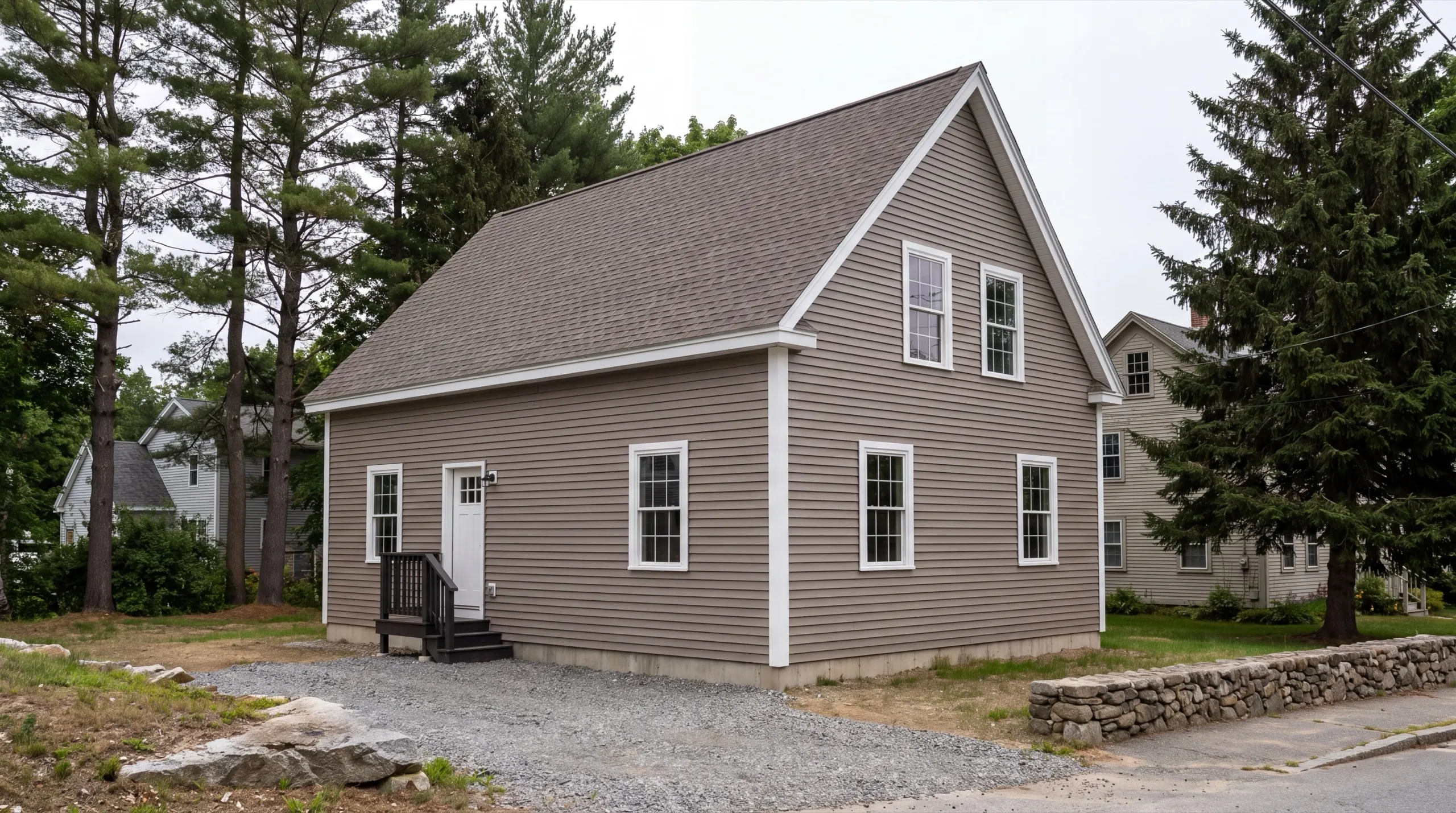 siding contractor in Hallowell, ME installing fiber-cement siding